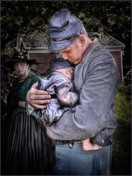 Photo of soldier holding his baby