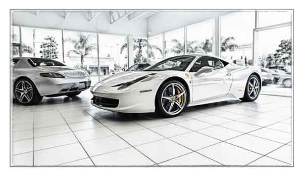 White Ferrari in white auto showroom