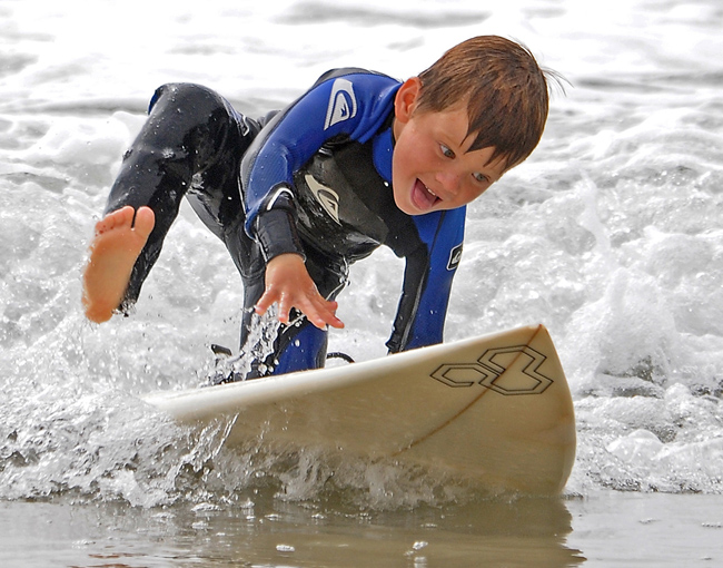 Young Boy on Surf Board