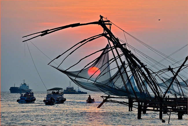 Fishing Boats, Nets in Foreground at Sunset