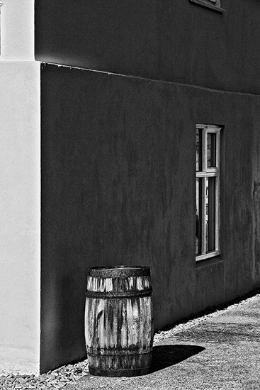 A study in contrasts between a wall and a barrel