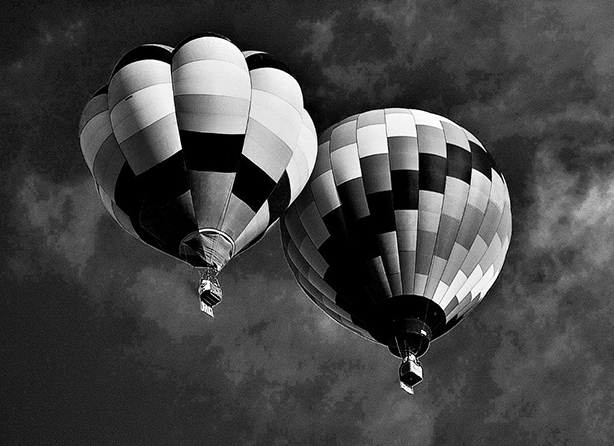 Two Hot Air Balloons against the Sky