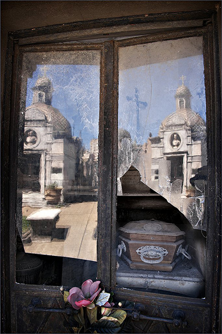 European city buildings seen through a mirror