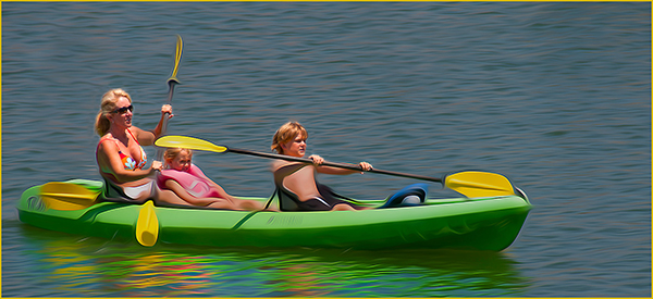 Mother and two children kayaking