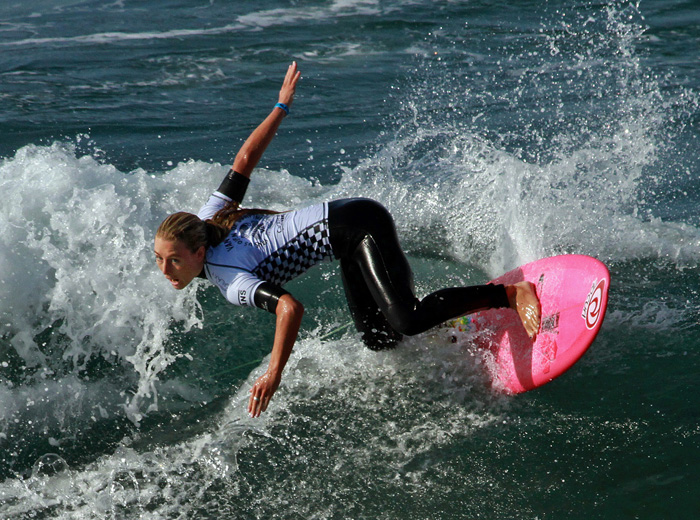 Girl Surfing on Pink Board