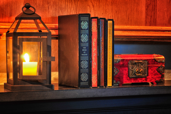 Still life of lantern and old books